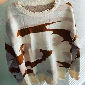 Distressed sweater